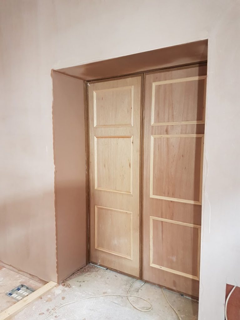 Bedroom plastered around new double doors by CT2 Plastering & Rendering, Orpington